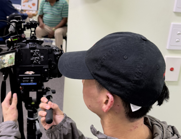 Filming on location for OSPP recipient John Qi
